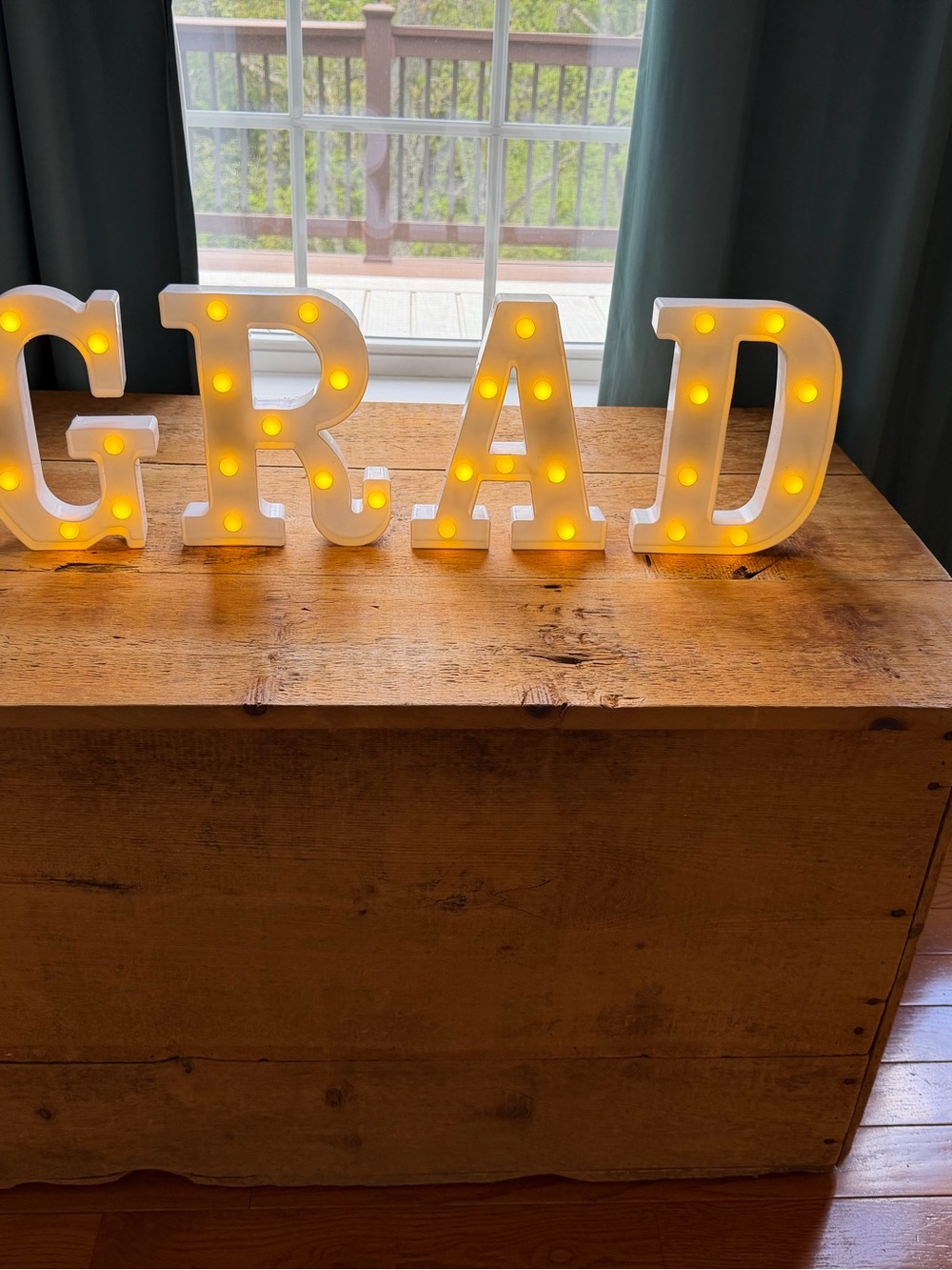 Light-Up Marquee Letters "G R A D" in White with Warm Yellow Bulbs